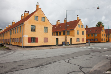 Exterior of Danish antique houses. Old buildings or public housing.