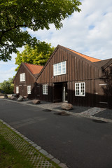 Fototapeta na wymiar Exterior of wooden terraced houses in Copenhagen