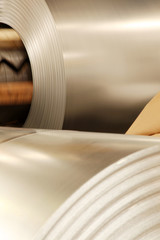 Obraz na płótnie Canvas Large aluminium steel rolls in the factory