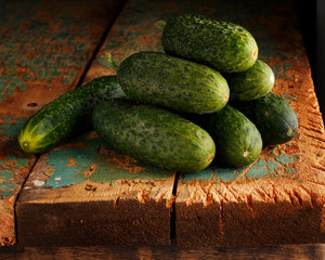 Cucumber on wooden background