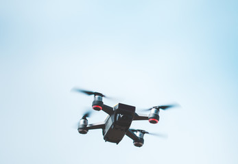 Drone flying over blue sky