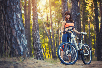 cyclist cycling mountain bike on Pine forest trail