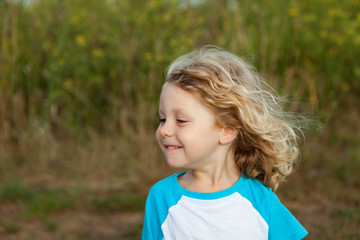 Small child enjoying of a sunny day