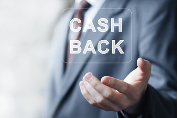 Businessman presses button CASH BACK connection in network.