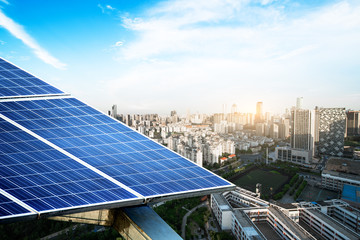 Aerial view of the city and the tower on top of the solar panel