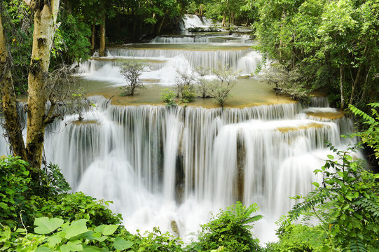 Beautiful waterfall in green forest in nature © nimon_t
