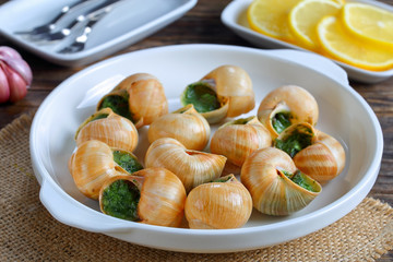 french Snails with herbs, butter, garlic