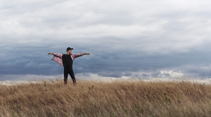 Man who feels free, looking at the horizon