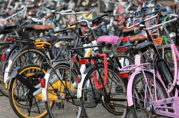 large parking lot with thousands of bikes in Amsterdam