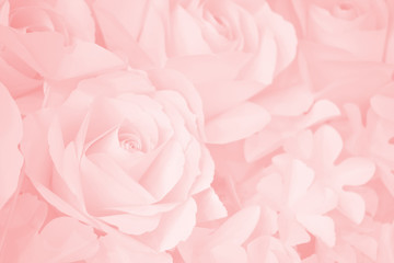 Pink rose paper flowers decorative background.