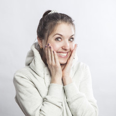 young happy woman portrait, surprised face expression