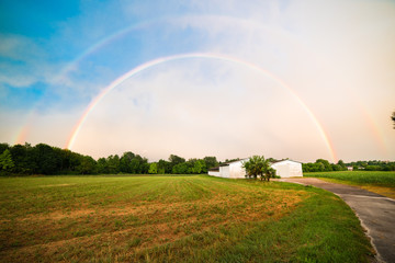 Naklejka premium Rainbow in the countryside