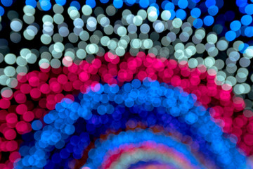 Multicolored abstract bokeh light at night for background.