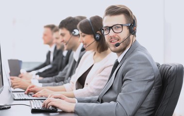 operator call center with colleagues sitting at the workplace