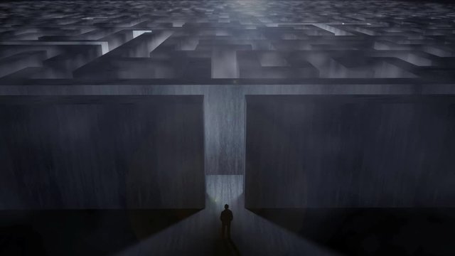 Man standing at the entrance of a gigantic labyrinth in a dramatic environment with fog