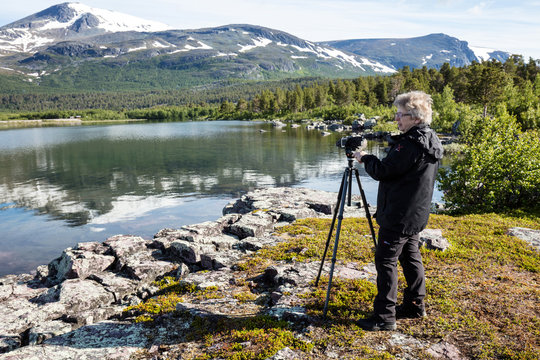 Fotograf i arbete