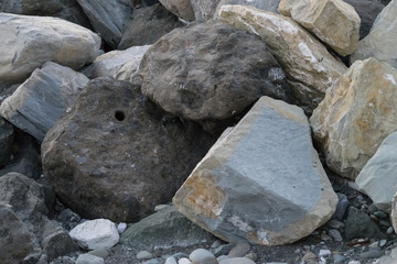 huge stones lying on the sea to protect the shore from blur in Imereti Bay Sochi