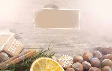 Christmas  gingerbreads on a wooden background. Christmas atmosphere. Blurry background with space left for copy. For brochures , greeting cards or .