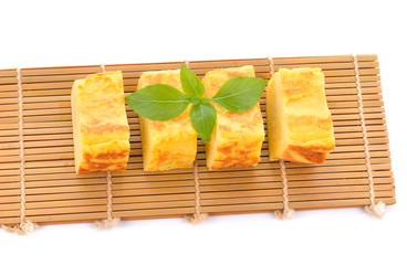 Eggs roll on a white background.