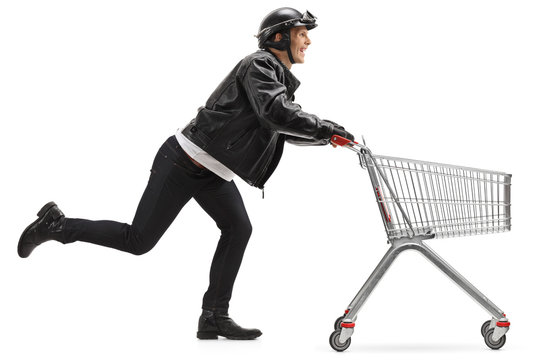Biker pushing an empty shopping cart