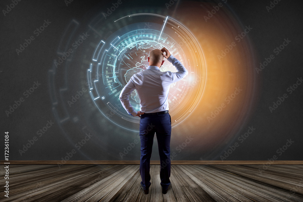 Aufkleber internatibusinessman in front of a wall with a globe communication displayed on a futuristic interfa