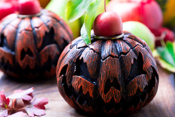 Jack-o-lantern on wooden background. Autumn concept. Halloween.