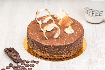 The cake with biscuits rings on the table