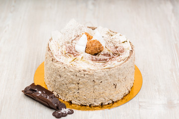 The sponge chocolate cake on the table