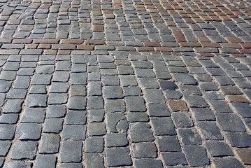 каменная текстура из фрагмента тротуара с булыжниками