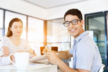 Young man in casual in office