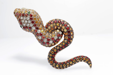 antique jewelry with diamonds, sapphires, rubies and gemstone, vintage gold clasp.