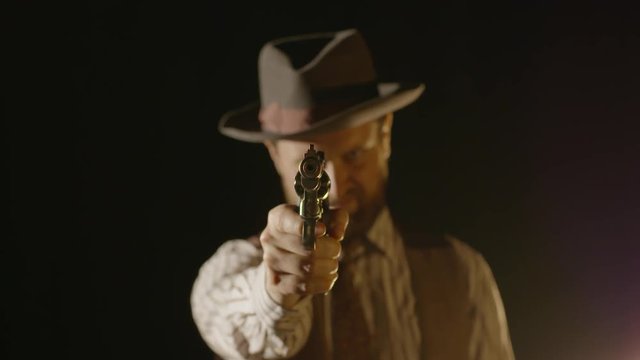 American Gangster Points Revolver Gun at Camera & Pulls Trigger, Gunshot & Cut to Black 