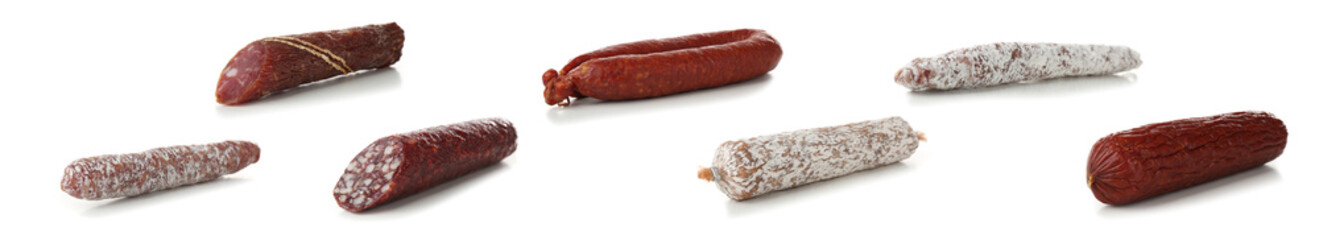 Different sausages on white background