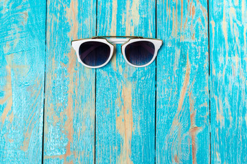 sunglass on the wooden background