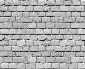 Stone pavement texture. Granite cobblestoned pavement background. Abstract background of old cobblestone pavement close-up. Seamless texture. Perfect tiled on all sides