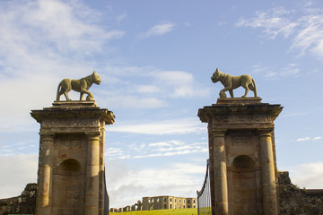 Lion sculptures on top of the stone gate posts at the Bishop's Gate entrance to Mussenden on the...