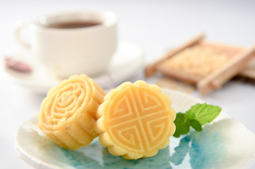 a pastry with mostly sweet fillings made for the Moon Festival, hence loosely translated as a moon cake or mung bean pastry.
