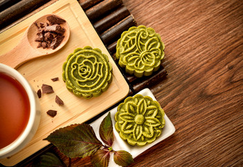 a pastry with mostly sweet fillings made for the Moon Festival, hence loosely translated as a moon cake or mung bean pastry.
