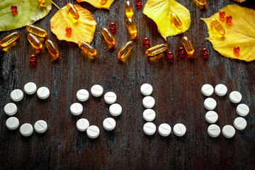 concept autumn cold treatment on wooden background top view