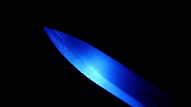 Sharp Knife / Blade Illuminated in Dark & Shimmering