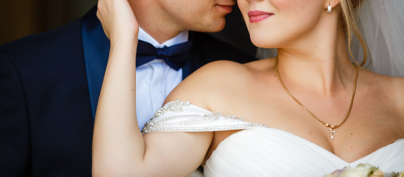 Just Married Couple Dancing Valse Outdoor, Free Space. Bride And Groom Hugs, Blurred Green Grass Background. First Wedding Dance Concept