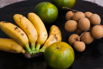 tropical fruits mandarins bananas longan