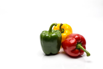 Three sweet pepper on white background.