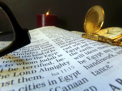 Still life macro of book, candle, reading glasses and pocket watch. Taken September, 2017