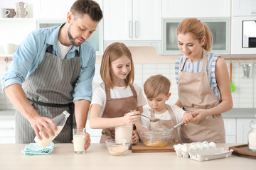 Family cooking in kitchen. Cooking classes concept