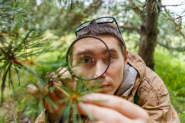 Picture of guy with magnifying glass