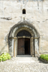 Arched door in an old stone building