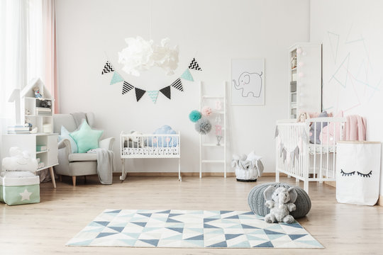 Spacious kid's room with banner