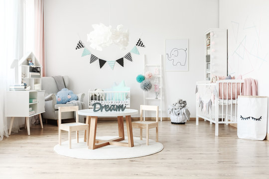Child's room with white furniture