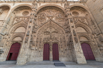 Main facade of Salamanca New Cathedral with red doors, Community of Castile and Le&oacute;n, Spain.  Declared a World Heritage Site in 1988